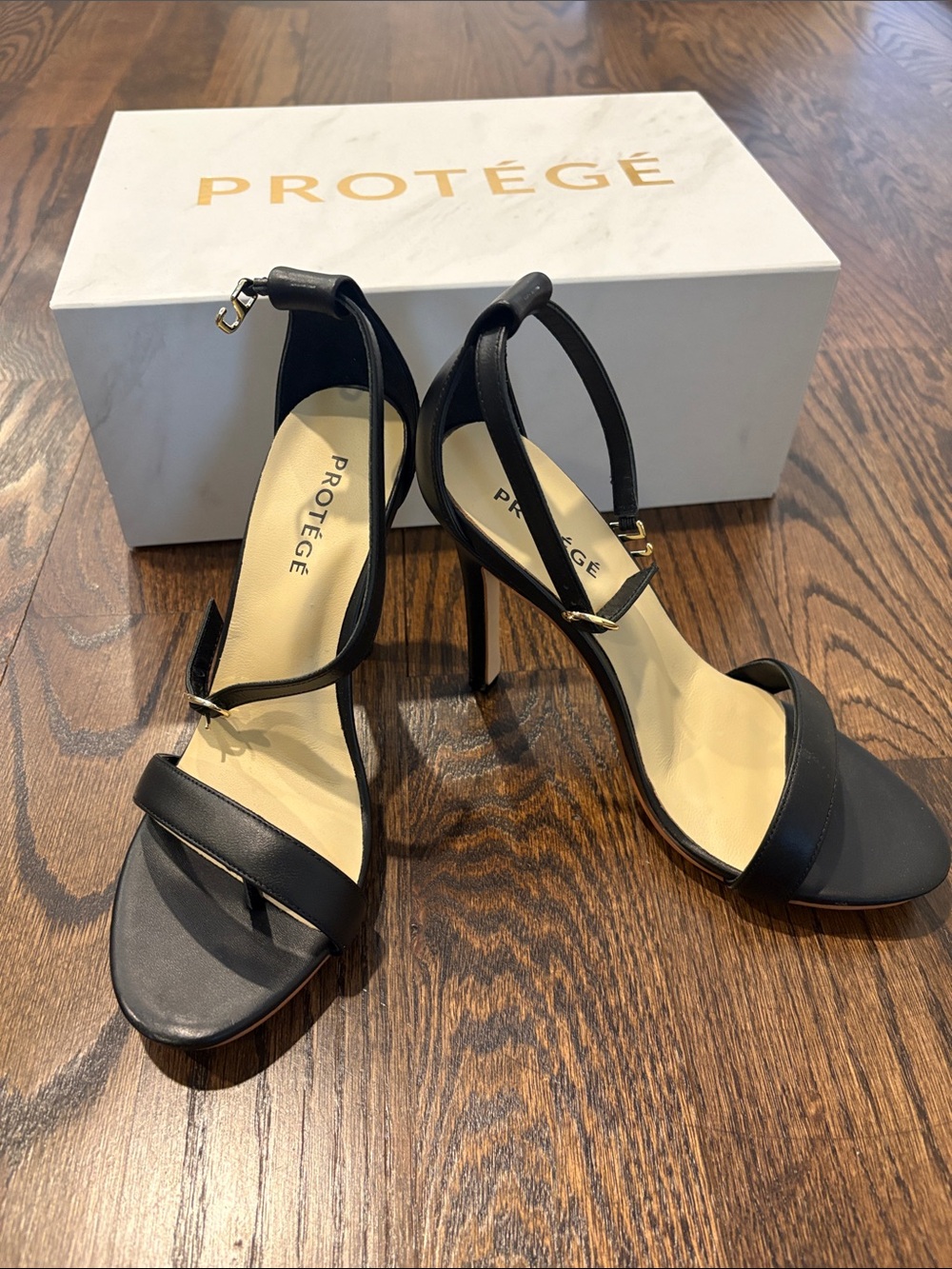 Protege Woman’s Black Leather Ankle-Strap High Heel Sandals Size 6.5